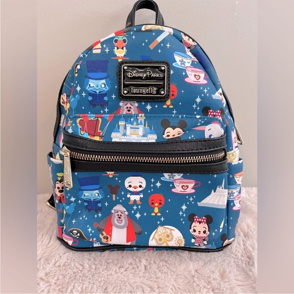 Loungefly Handbags - Loungefly Disney Parks Magic Kingdom Park Attractions
Mini Backpack